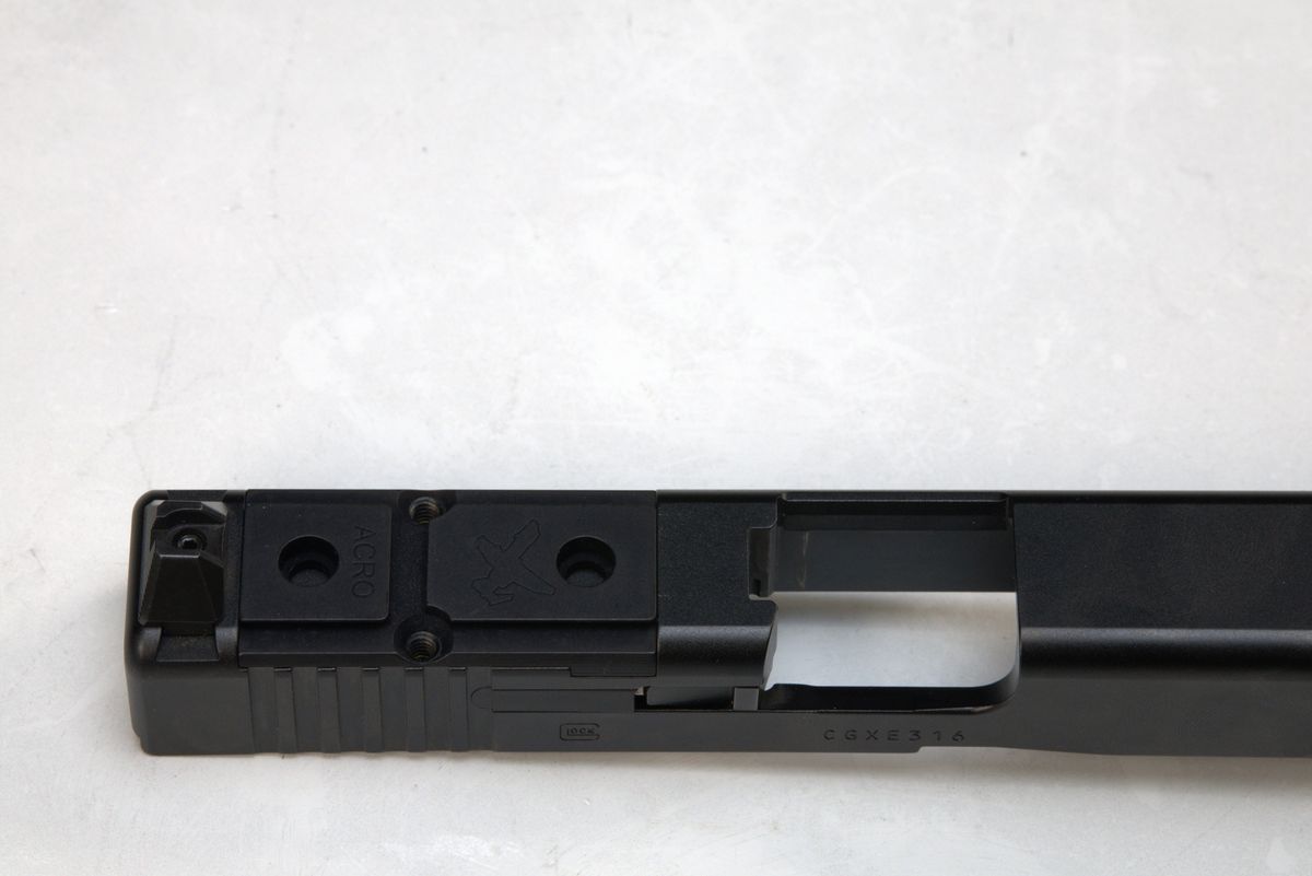 Acro footprint plate installed on Glock Gen 6 slide showing ACRO engraving